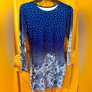 New, never worn. Cool, comfortable, figure flattering dress. Large